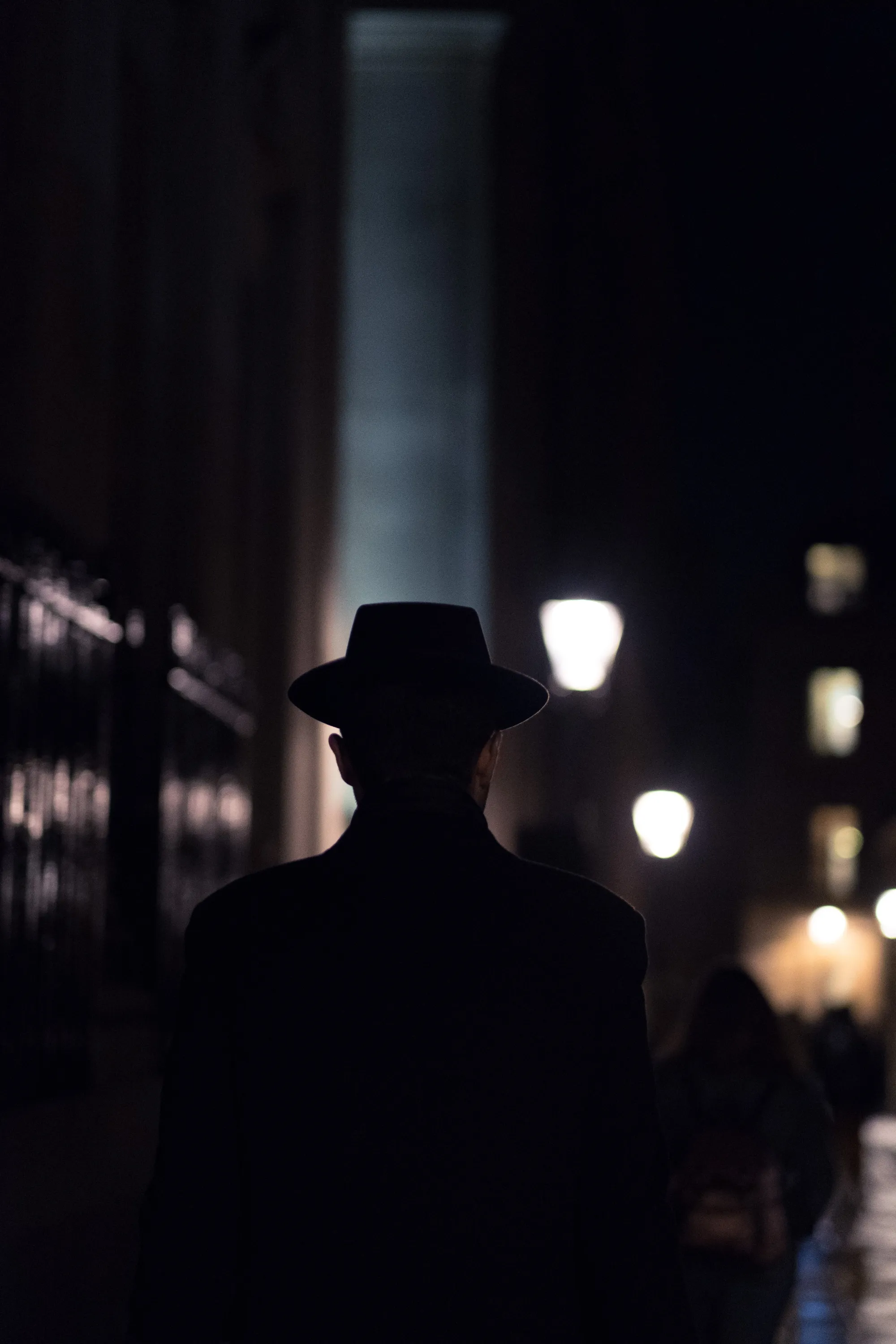 HiddenNYC mood: a figure on a night street