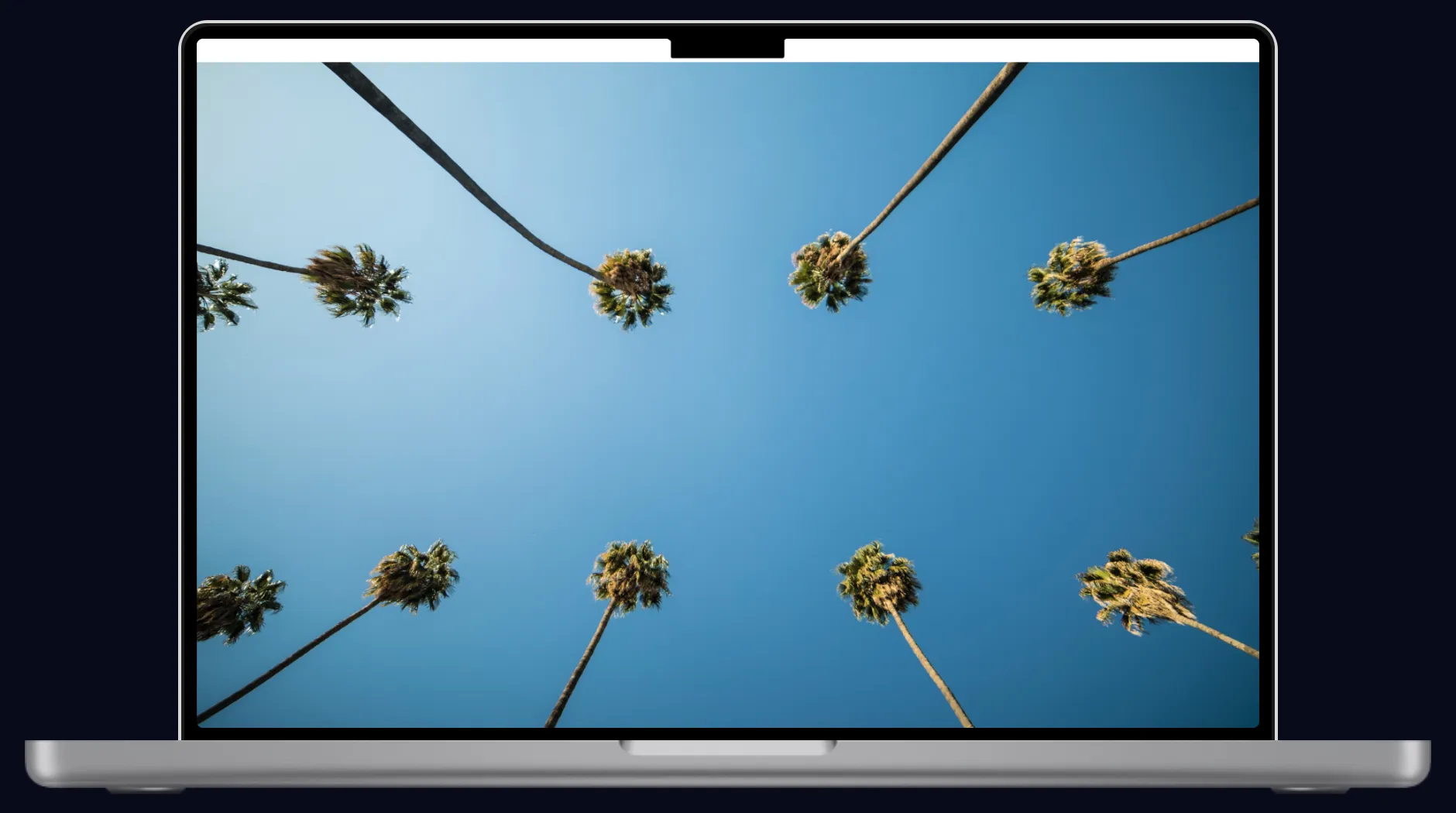 Before: a white menu bar leaves the notch showing